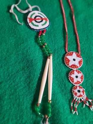 Beaded rosette ornament with hairpipe, glass crystal and feather-fluff drop, plate 117