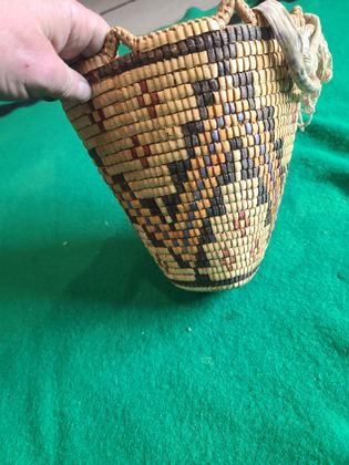 Fully imbricated polychrome Klickitat-type huckleberry basket with cloth-bound rim and cotton tumpline