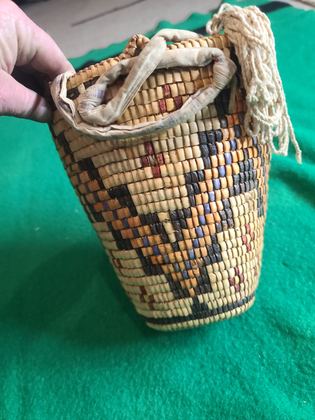 Fully imbricated polychrome Klickitat-type huckleberry basket with cloth-bound rim and cotton tumpline, plate 190