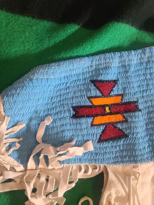 Beaded-yoke buckskin dress, light blue lane-stitch ground, plate 2