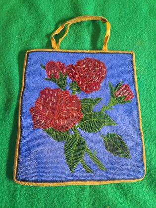 Plateau contour-beaded rose flat bag on cornflower-blue ground